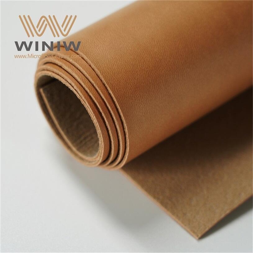 IntroducingWaterproof Leather Fabric Odmhsasour high-quality 1mm Scratch-Resistant PU Faux Leather for making garment labels! This premium material boasts excellent durability, ensuring that your labels will remain intact and looking great even after repeated washings and wear