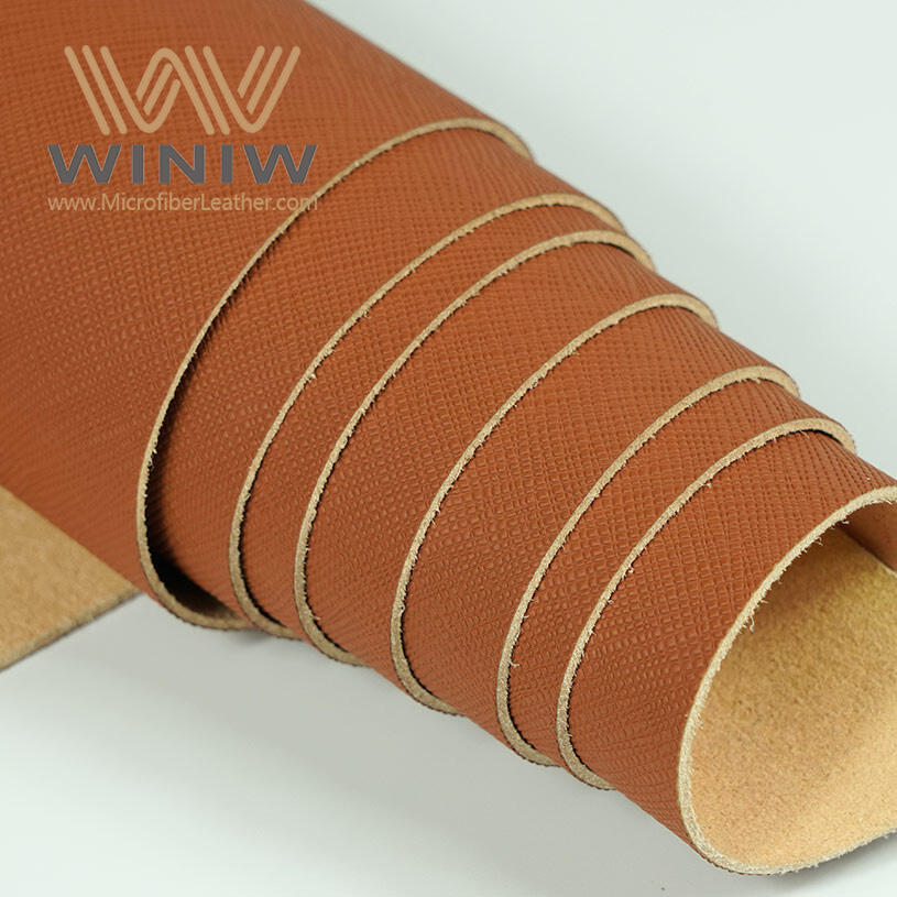 Crafted with precision, this material boasts an exquisite texture that mimics the grain and suppleness of natural leather, providing a luxurious aesthetic without compromising on practicality