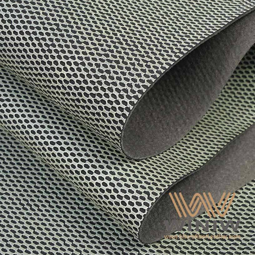 The dual-layer construction features a thermally adaptive PU surface that remains pliable in sub-zero temperatures and resists softening in high heat, ensuring consistent performance in climates ranging from arctic training grounds to tropical stadiums