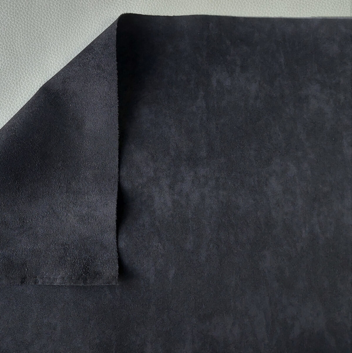 An application scenario or product detail of black alcantara material - Image 11