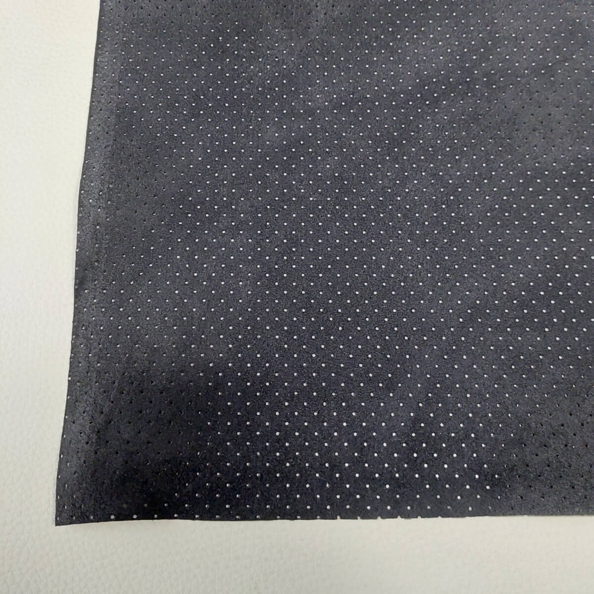 An application scenario or product detail of black alcantara material - Image 17