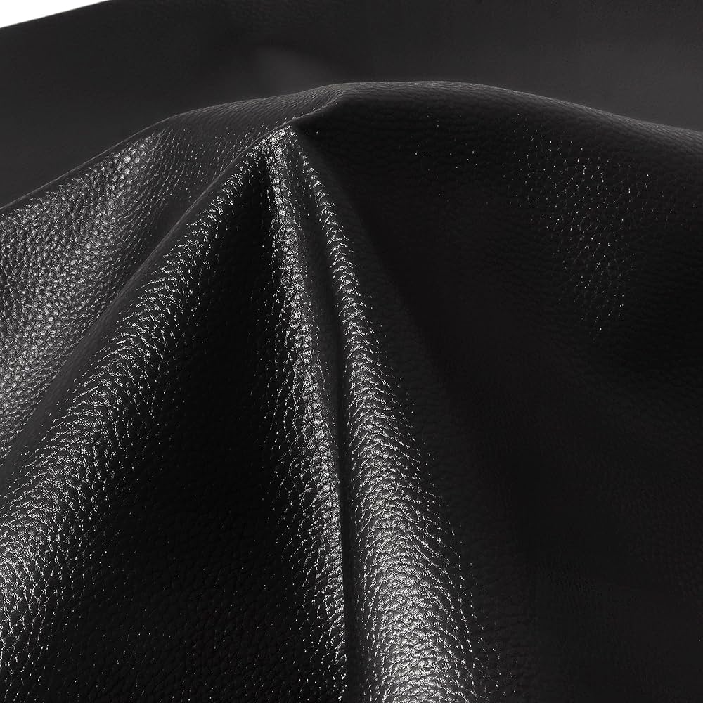 An application scenario or product detail of black fake leather fabric - Image 1