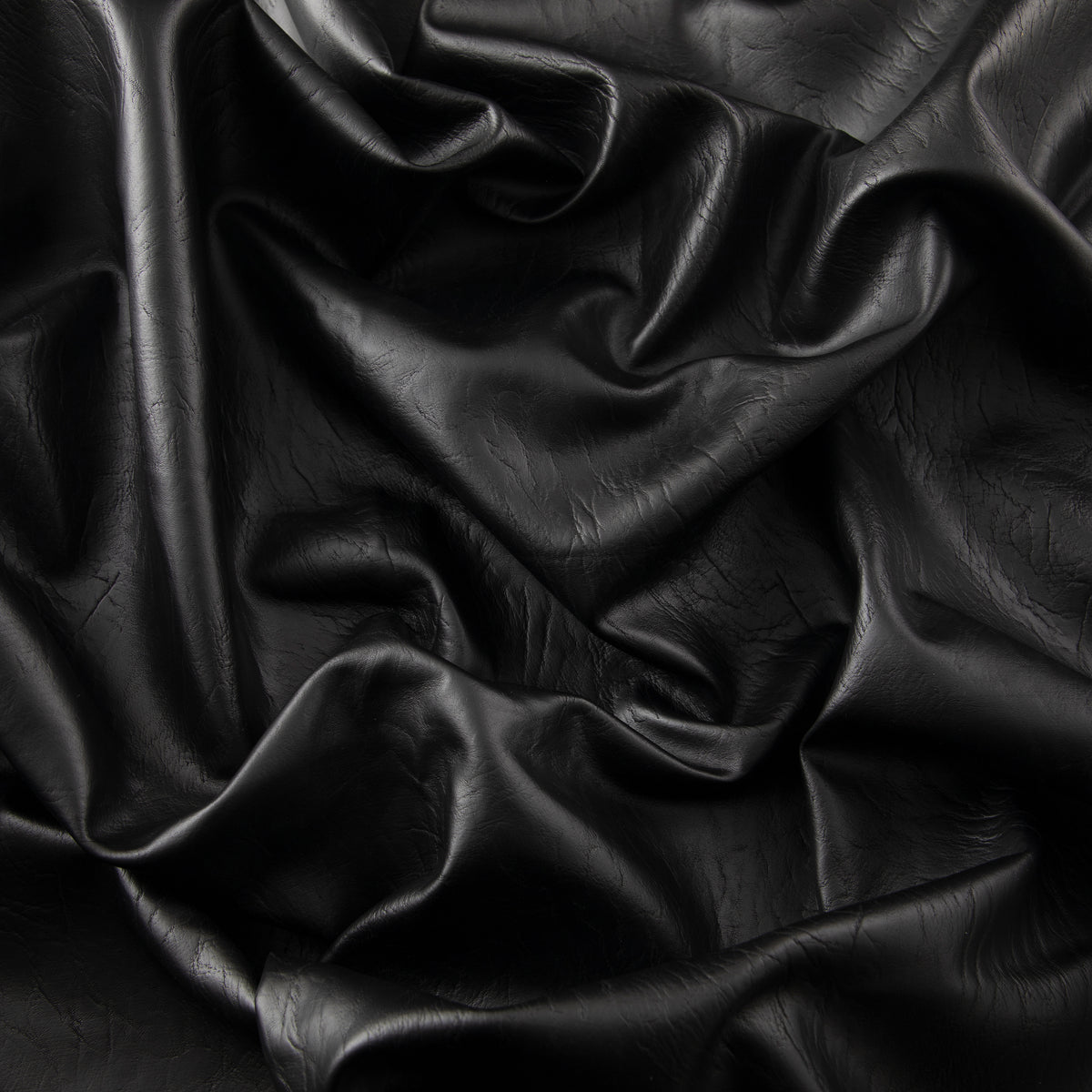 An application scenario or product detail of black fake leather fabric - Image 5