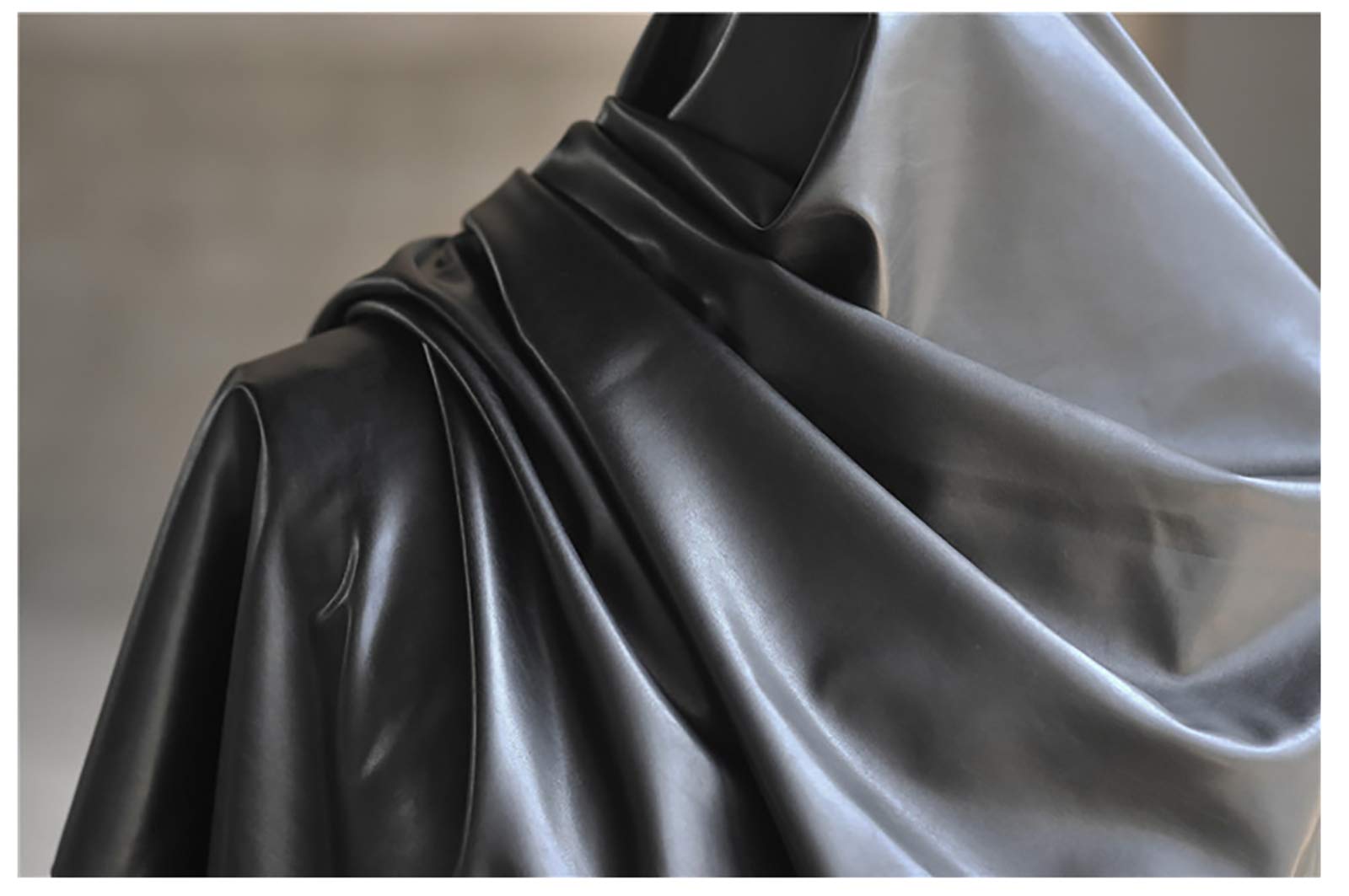 An application scenario or product detail of black fake leather fabric - Image 14