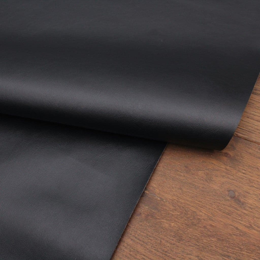 An application scenario or product detail of black faux leather upholstery fabric - Image 12