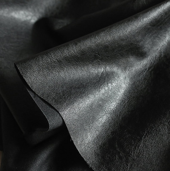 An application scenario or product detail of black faux leather upholstery fabric - Image 14
