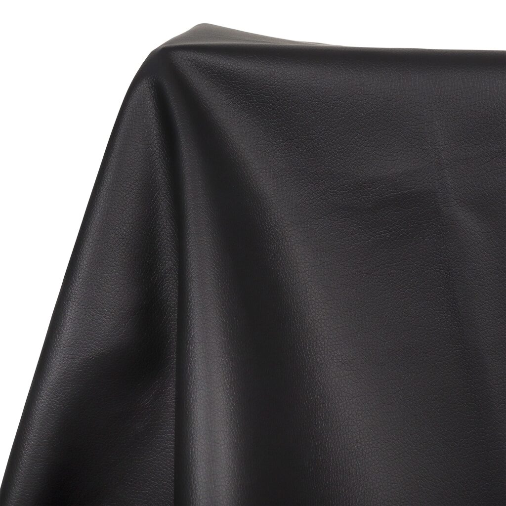 Featured image for the black faux leather upholstery fabric guide