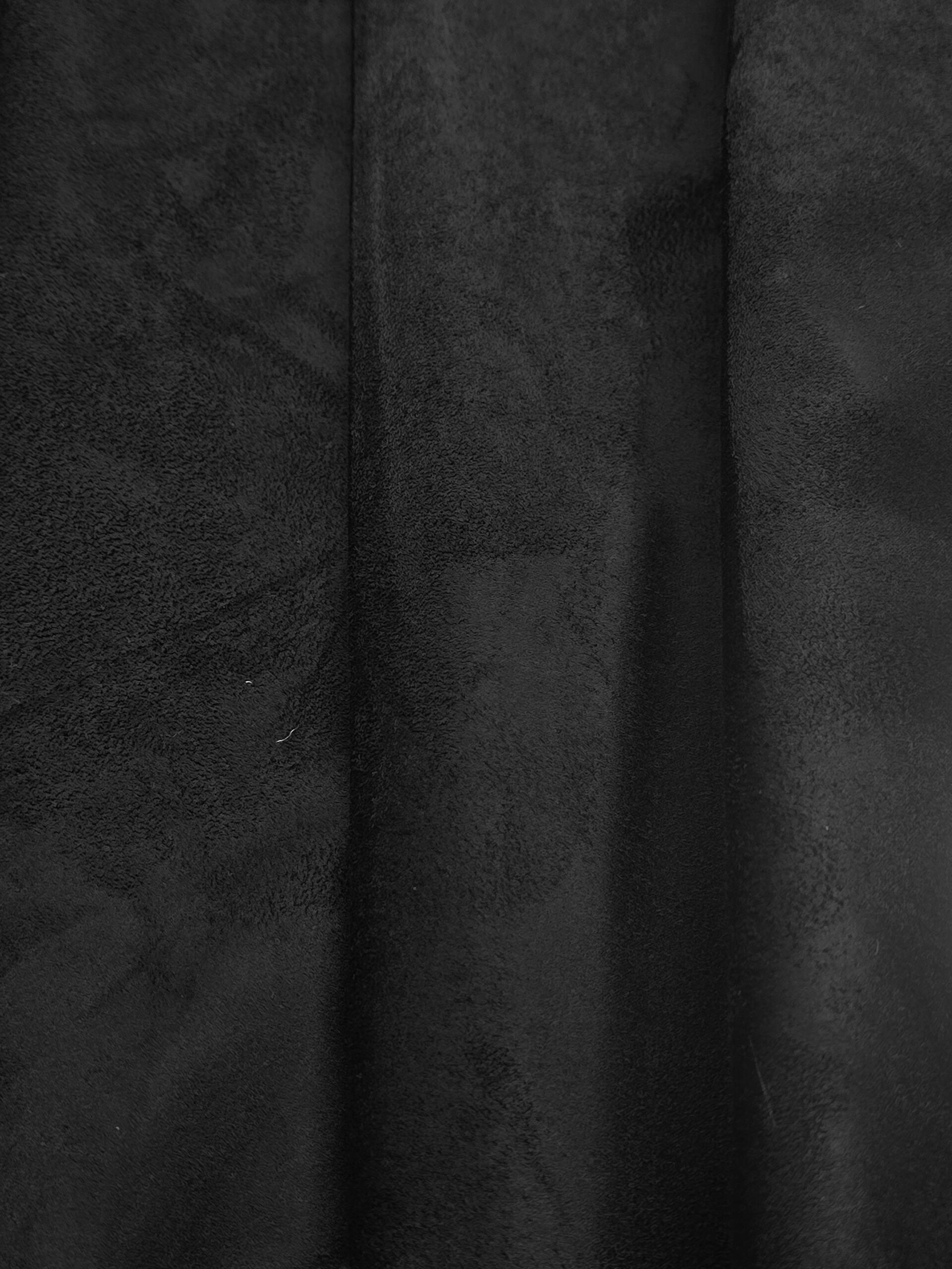 An application scenario or product detail of black faux suede fabric - Image 7