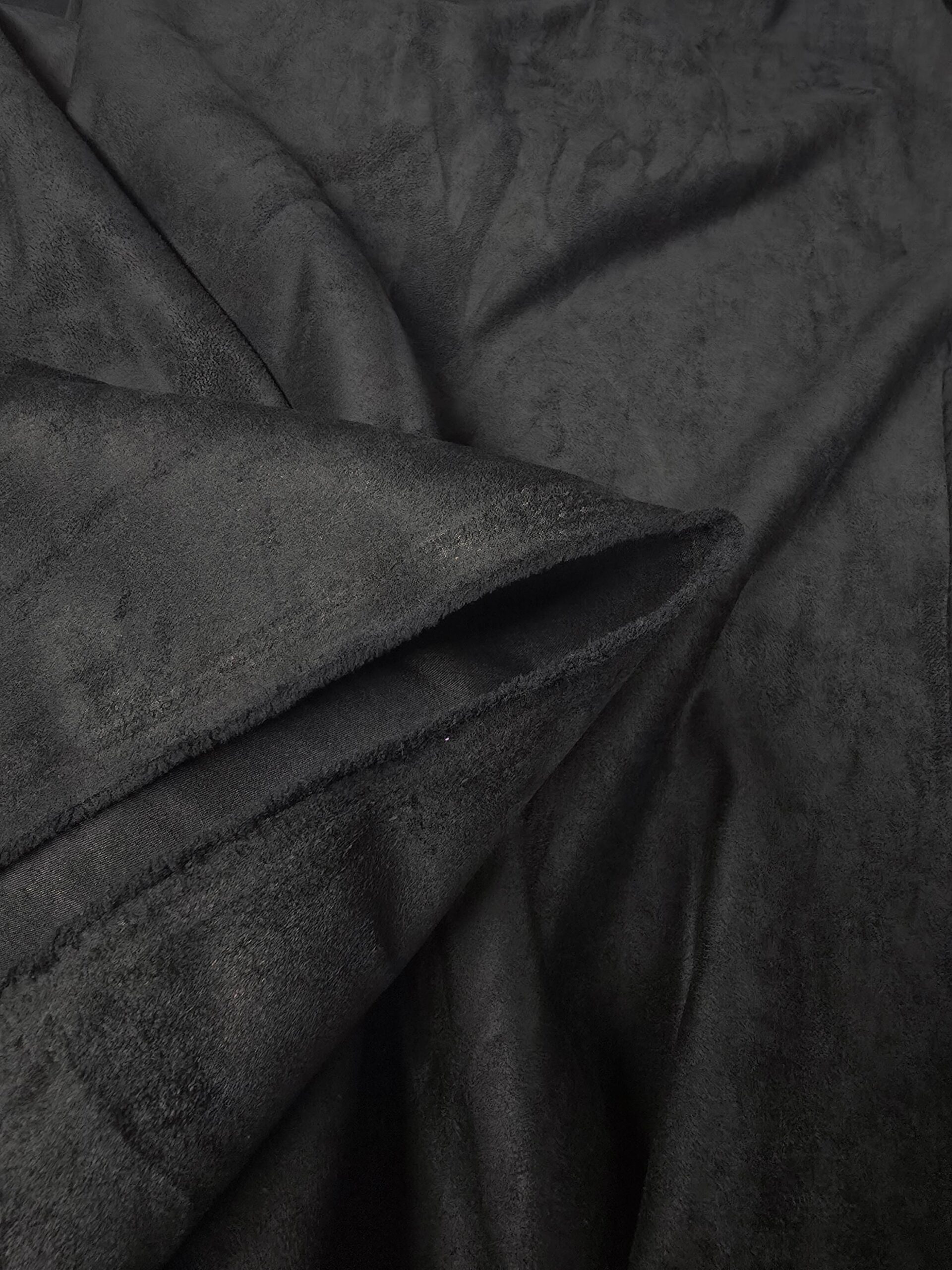 An application scenario or product detail of black faux suede material - Image 4