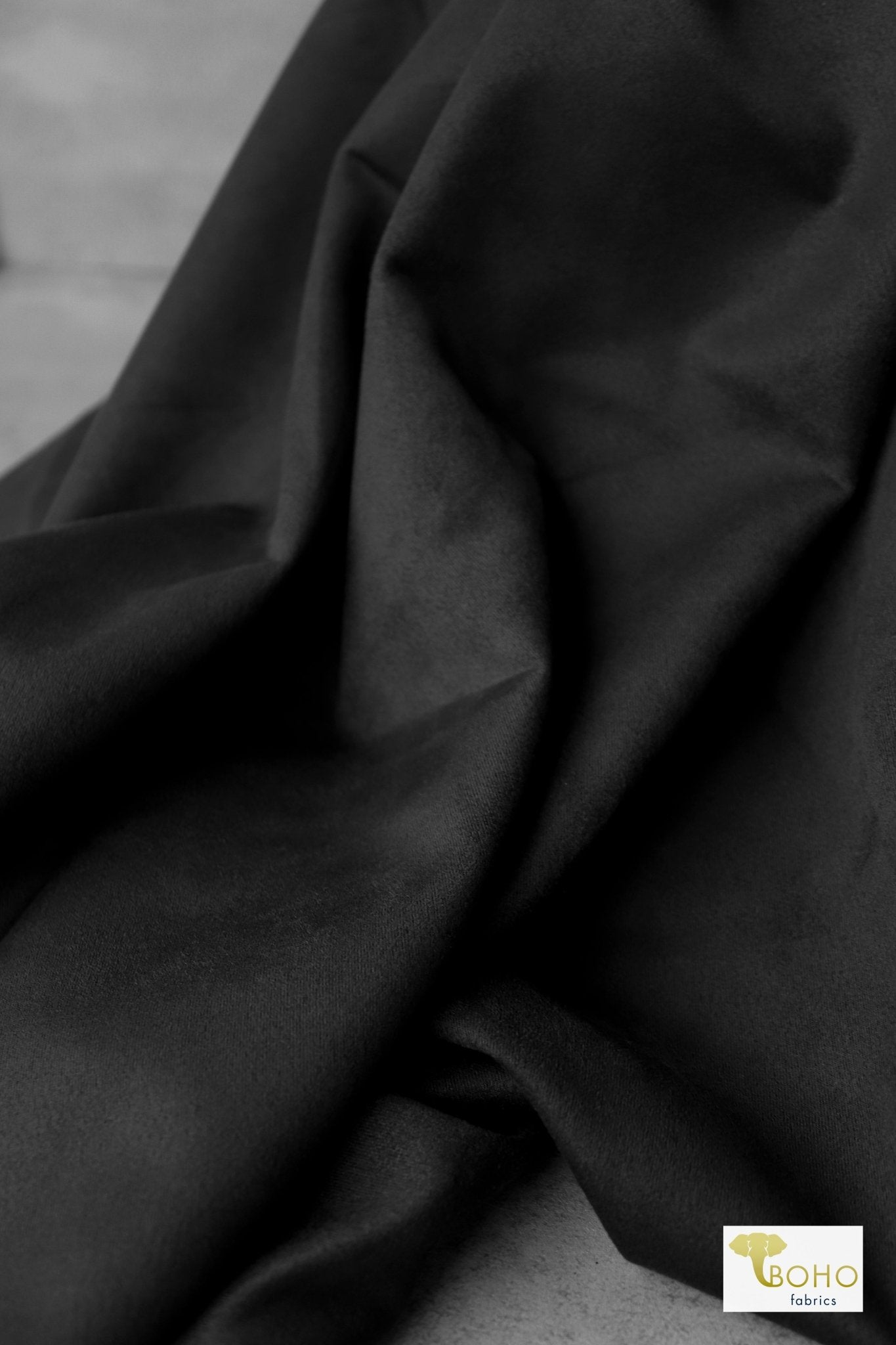 An application scenario or product detail of black faux suede material - Image 13