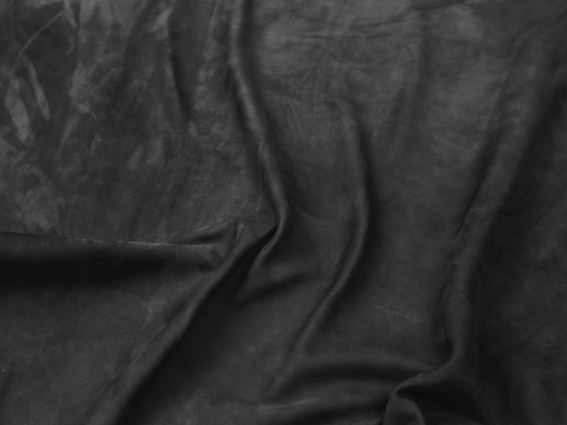 An application scenario or product detail of black suede leather fabric - Image 14