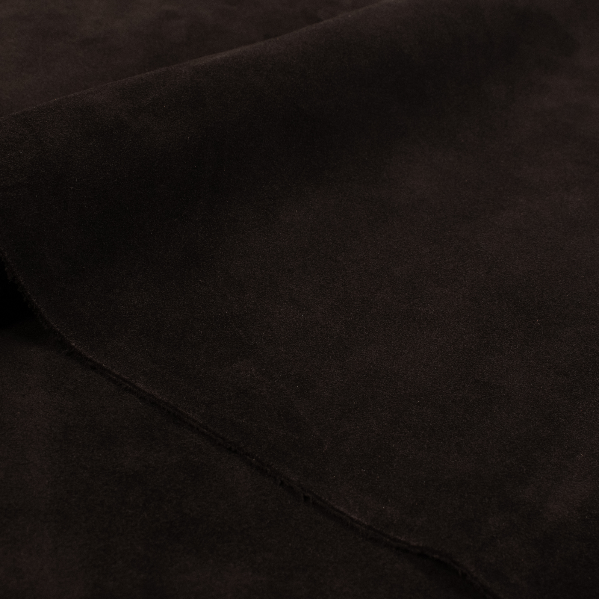 An application scenario or product detail of black suede leather fabric - Image 15