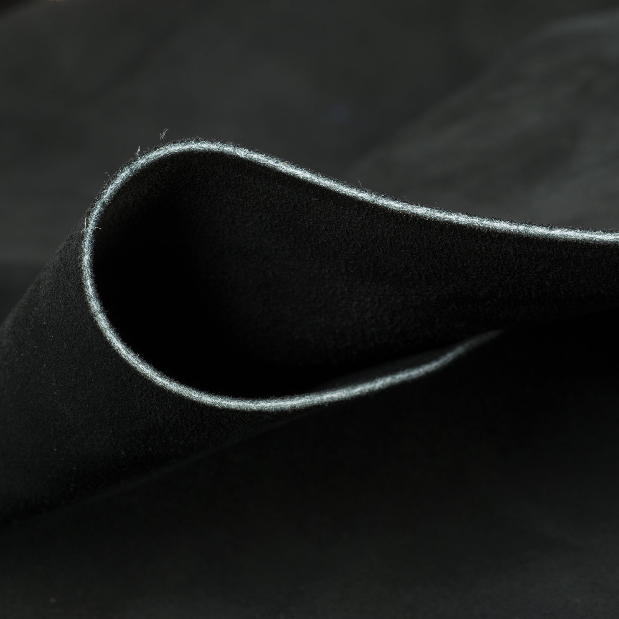 An application scenario or product detail of black suede leather fabric - Image 20