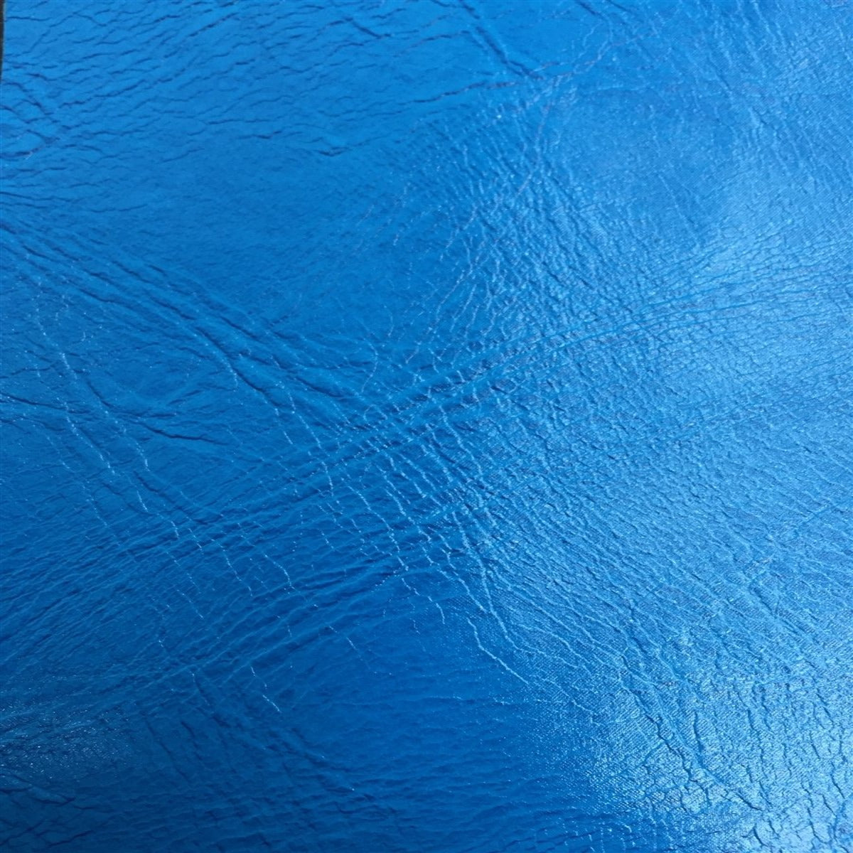 An application scenario or product detail of blue faux leather fabric - Image 10