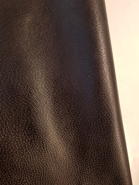 An application scenario or product detail of brown leather fabric - Image 2