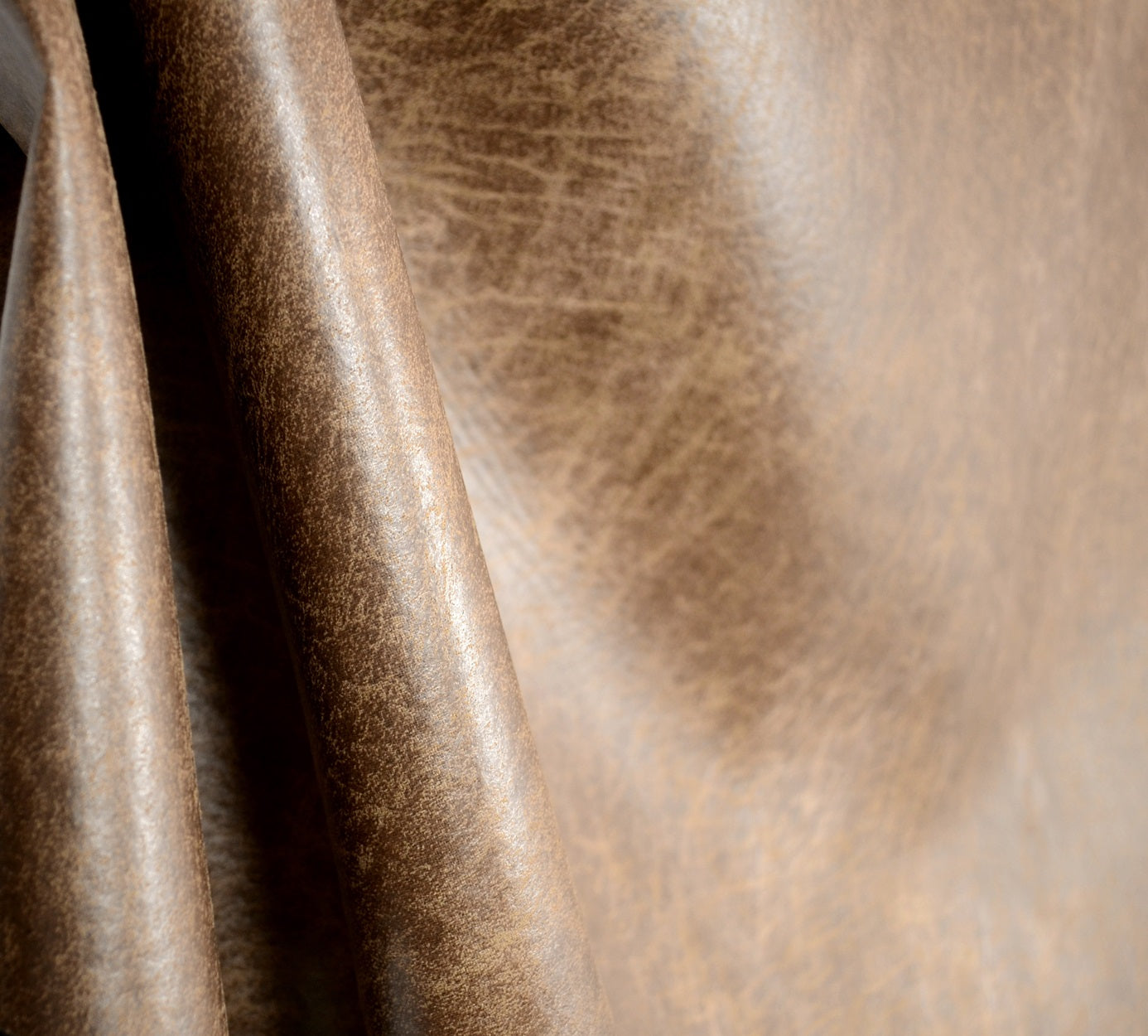 An application scenario or product detail of brown leather upholstery fabric - Image 17