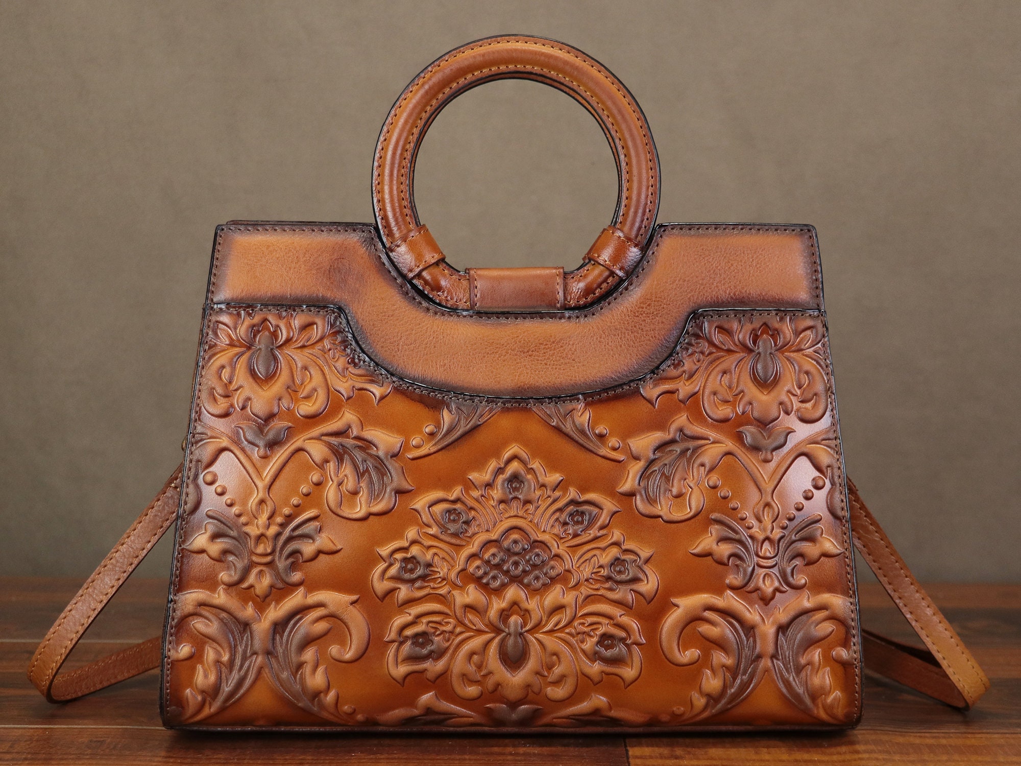 An application scenario or product detail of custom embossed leather bag - Image 15