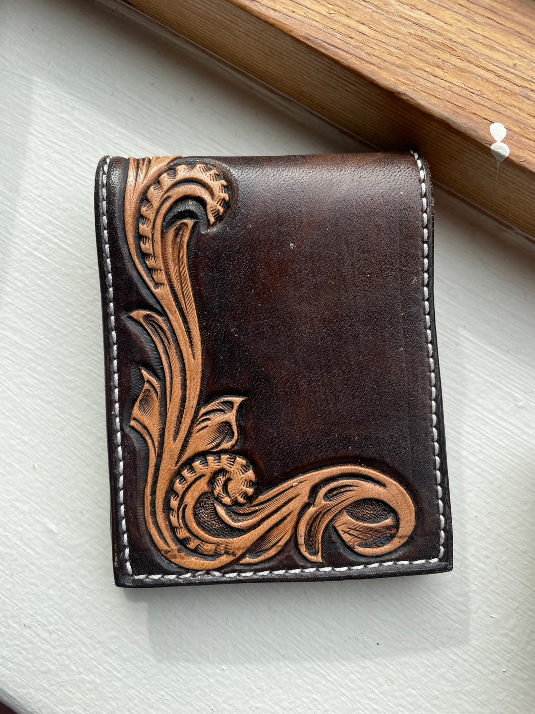 An application scenario or product detail of custom hand tooled leather wallets - Image 3