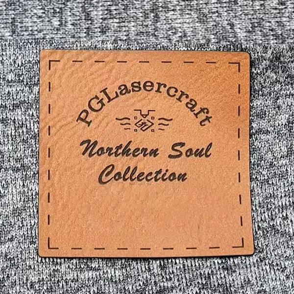 An application scenario or product detail of custom leather patches for jackets - Image 13