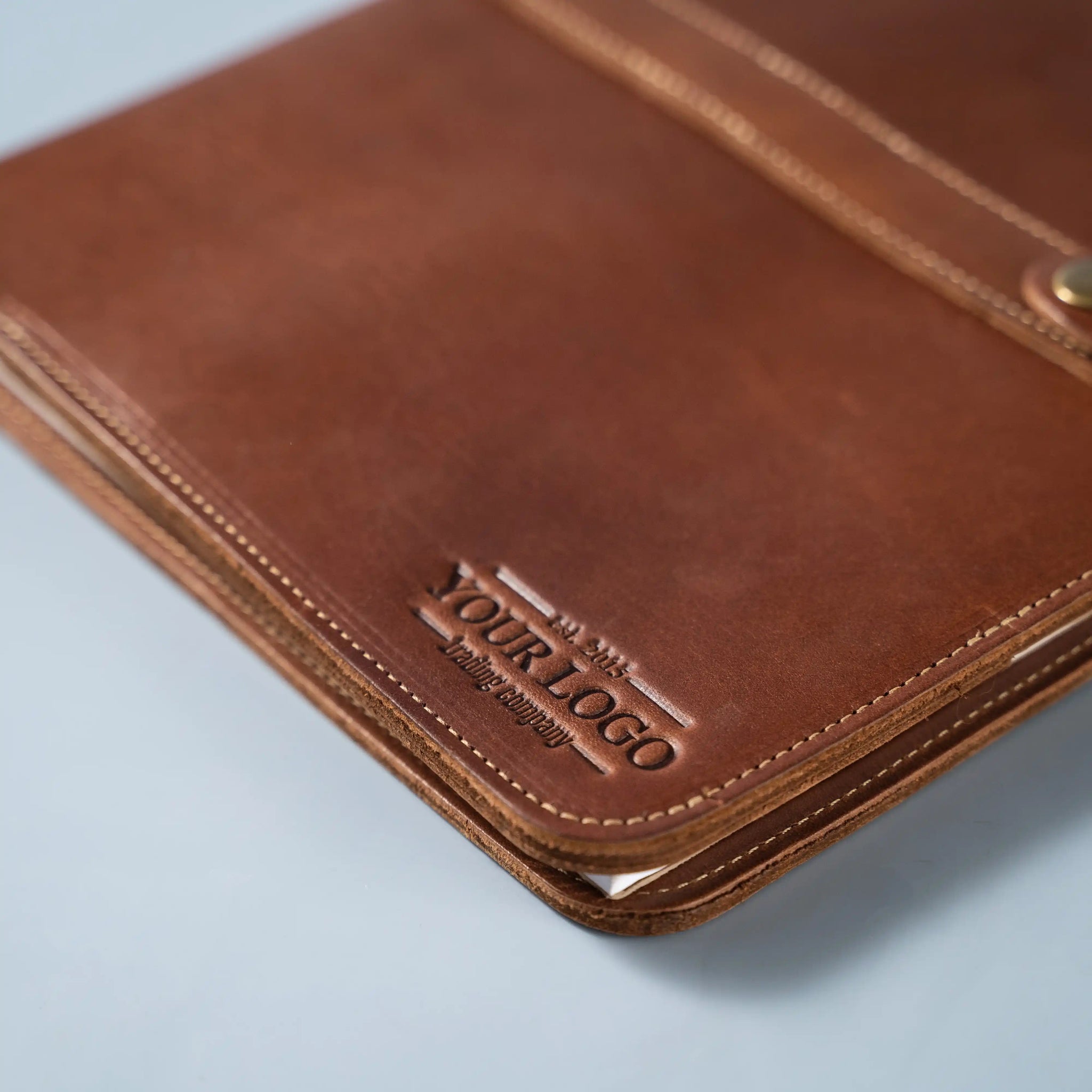 An application scenario or product detail of custom leather portfolio with logo - Image 22
