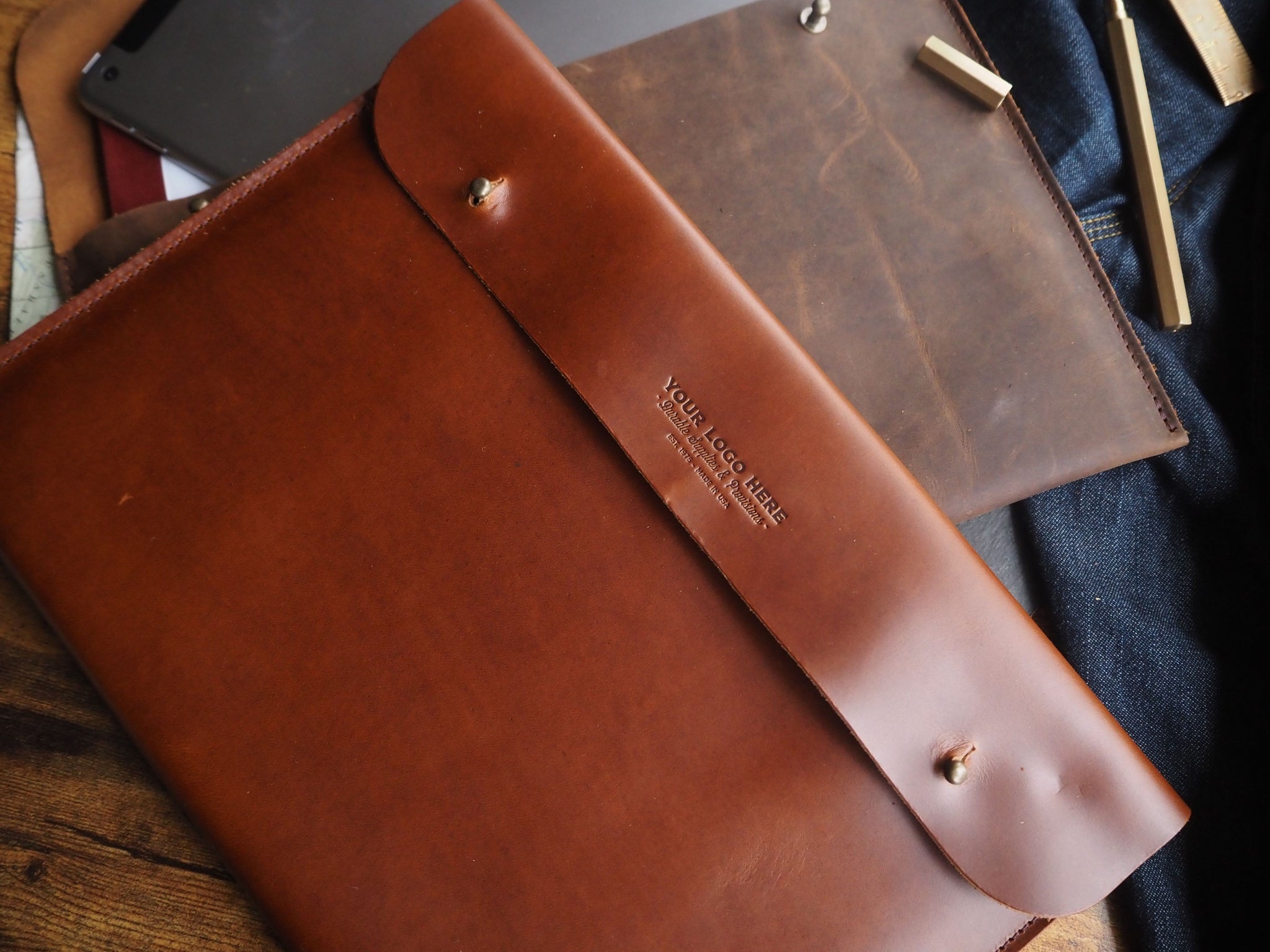 An application scenario or product detail of custom leather portfolio with logo - Image 23