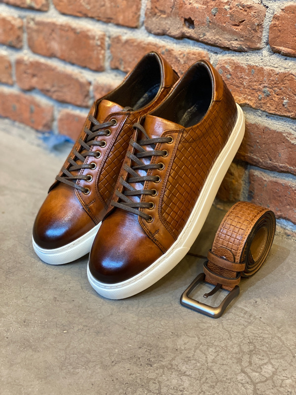 An application scenario or product detail of custom leather sneakers - Image 1