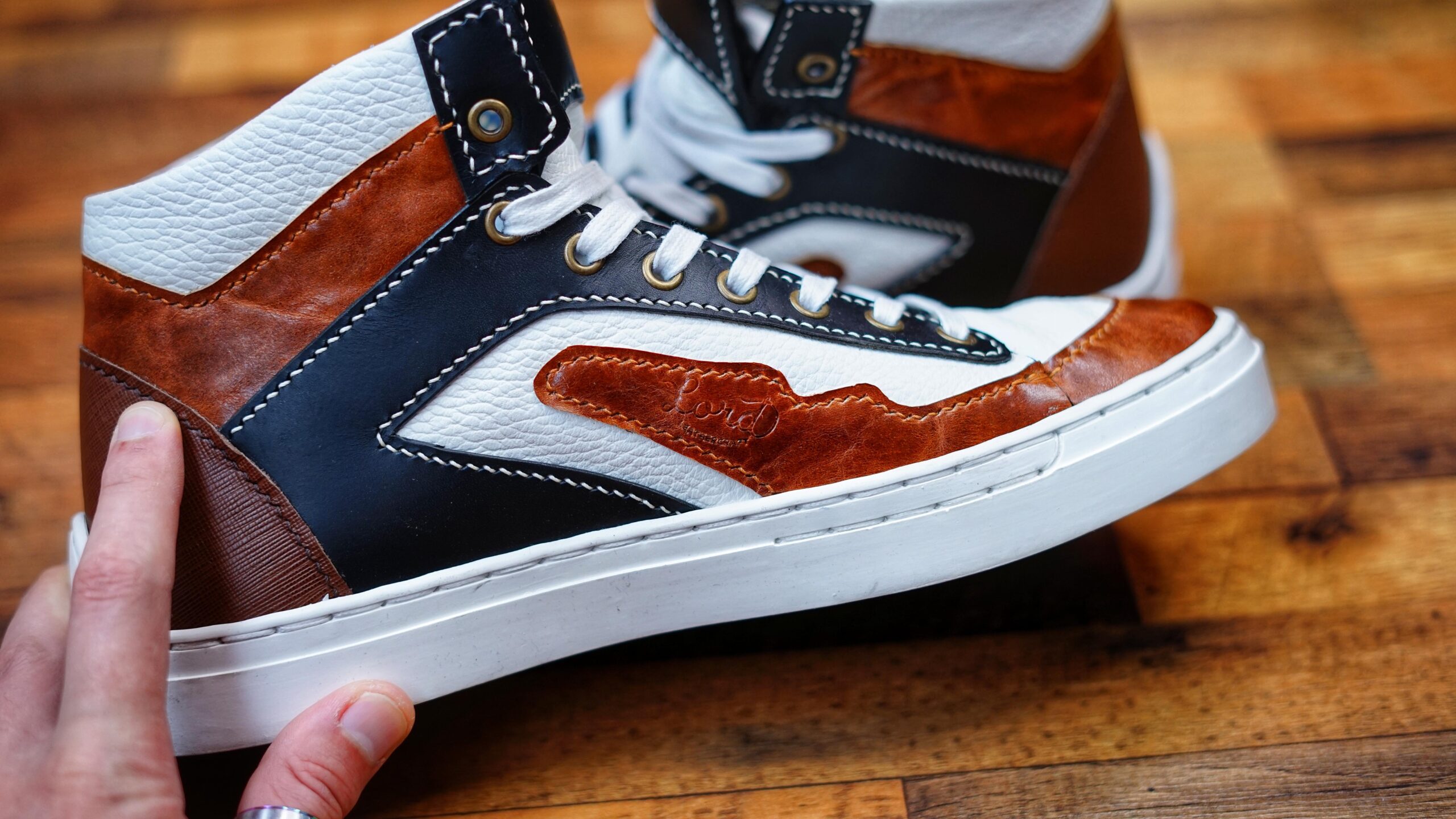 An application scenario or product detail of custom leather sneakers - Image 21