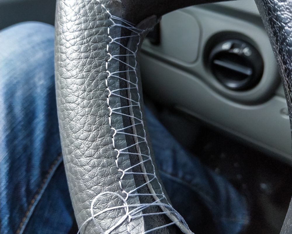 An application scenario or product detail of custom leather steering wheel covers - Image 20