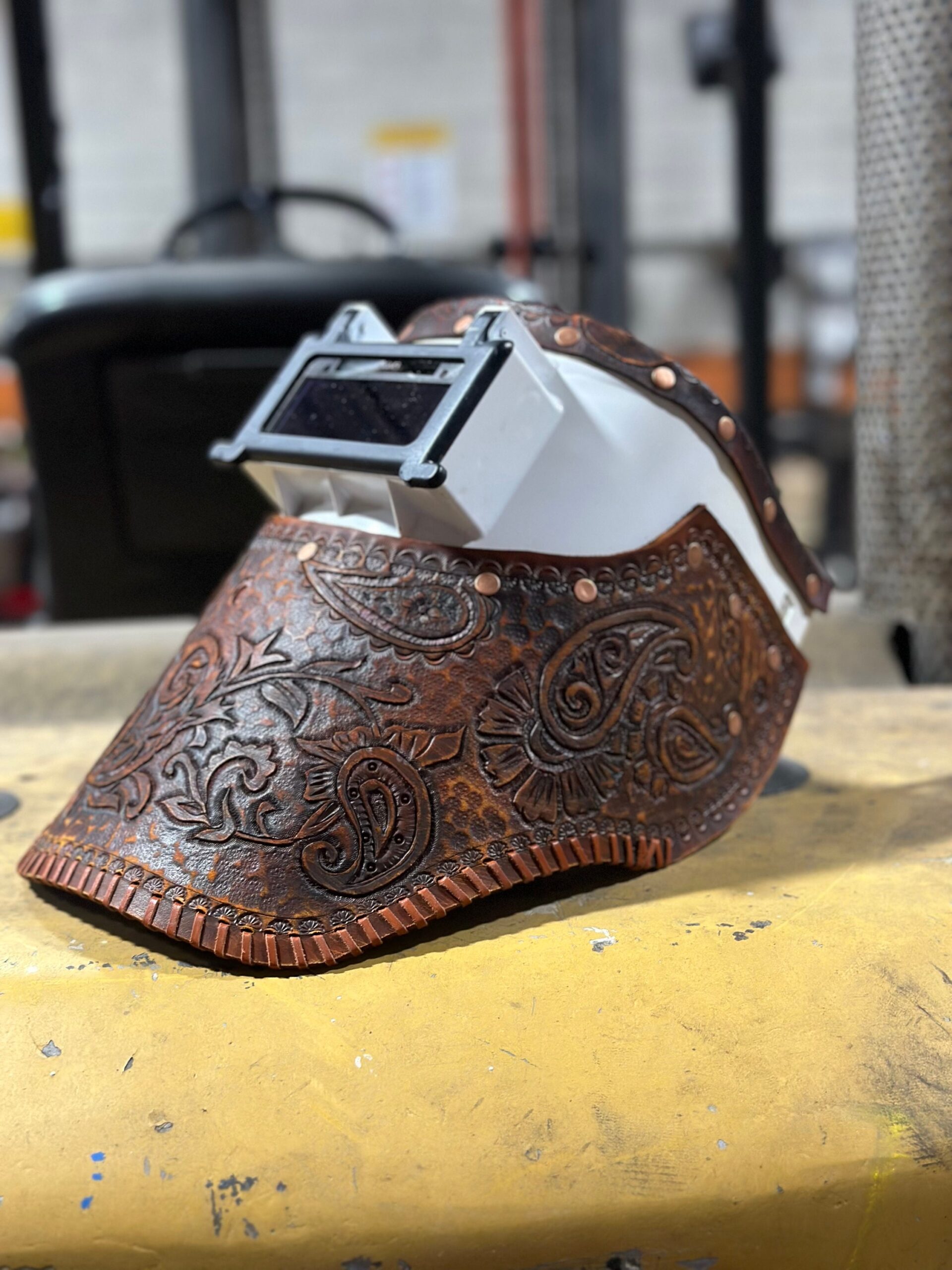 An application scenario or product detail of custom leather welding hoods - Image 3