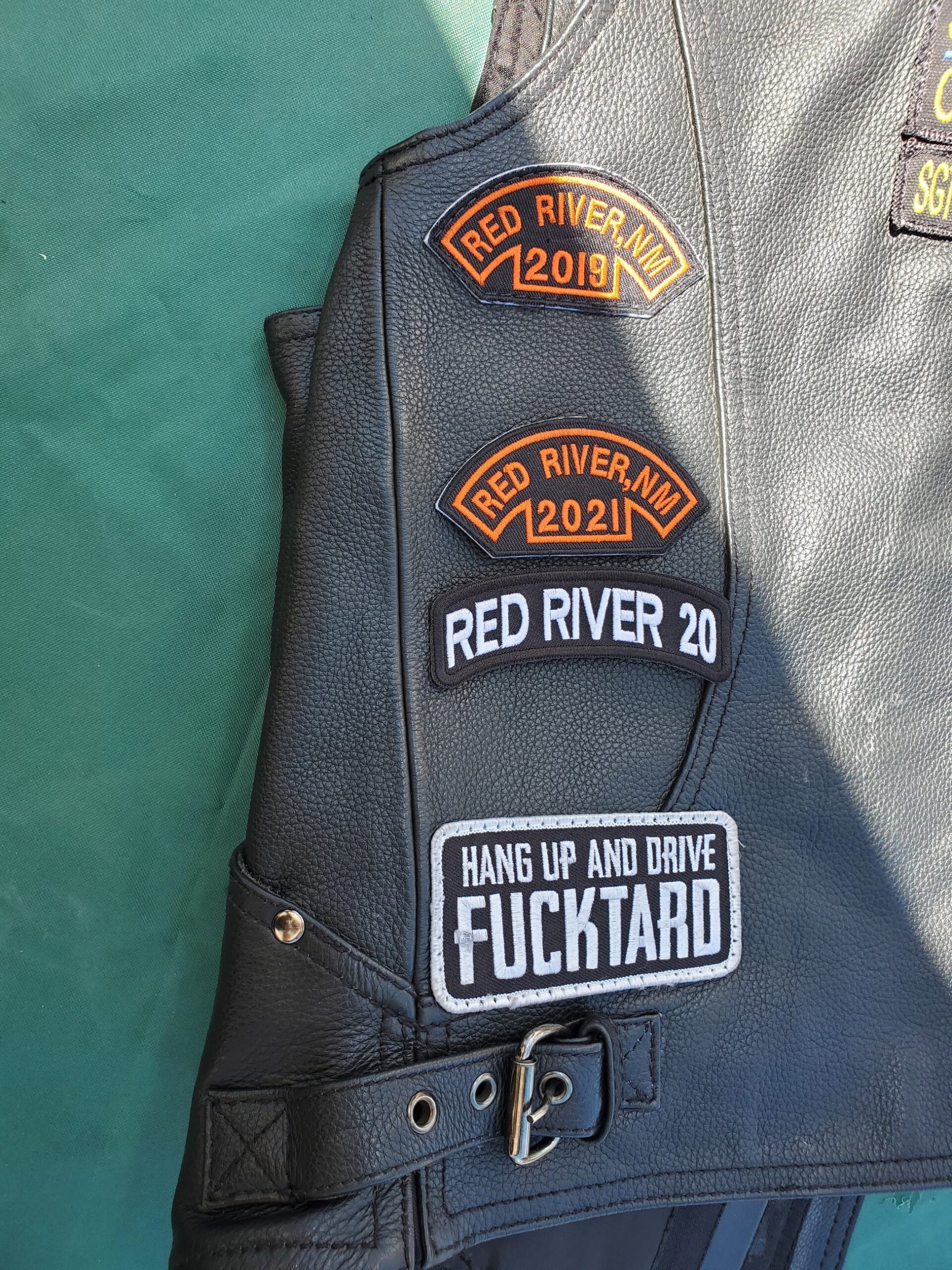 An application scenario or product detail of custom patches for leather vest - Image 8