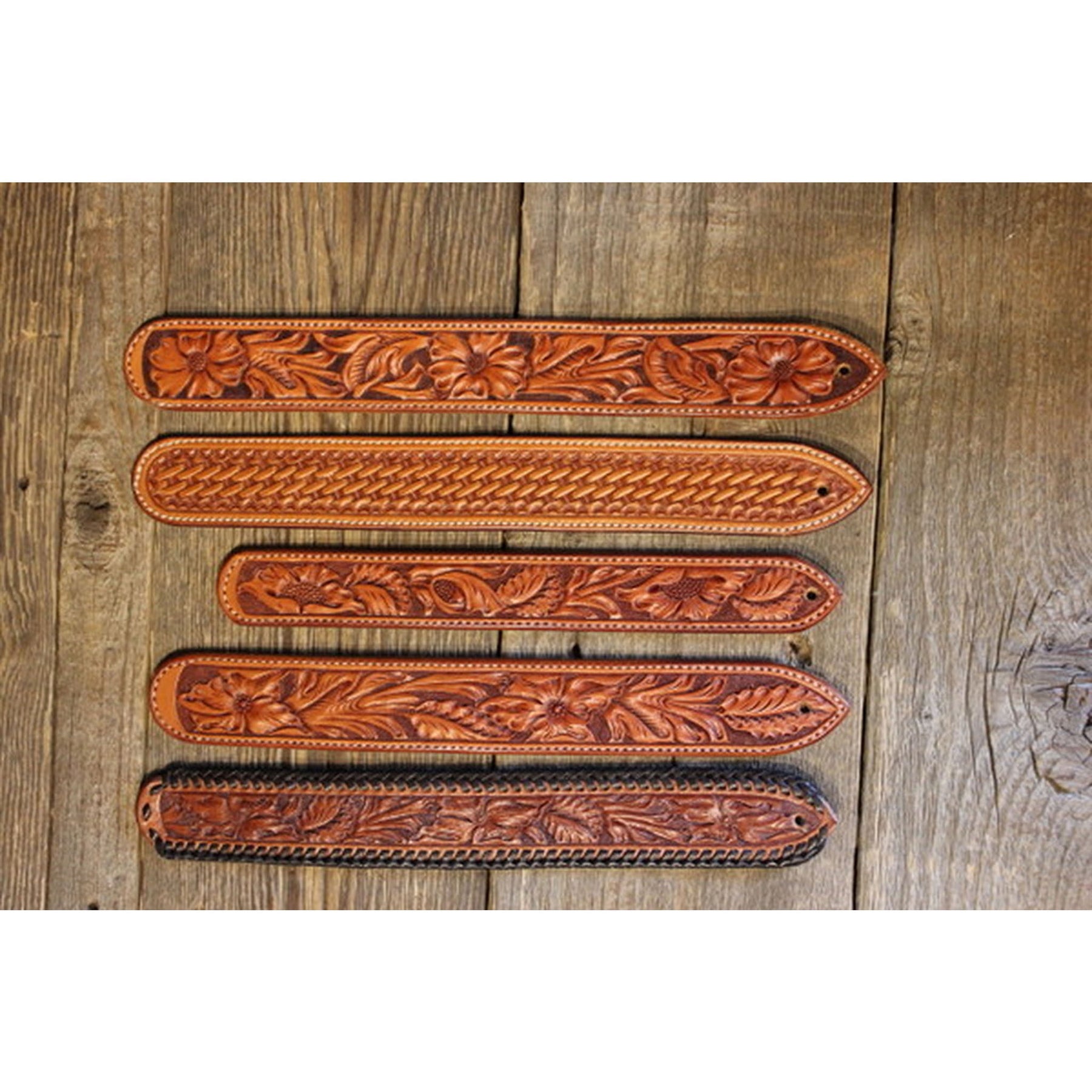 An application scenario or product detail of custom tooled leather belts - Image 1