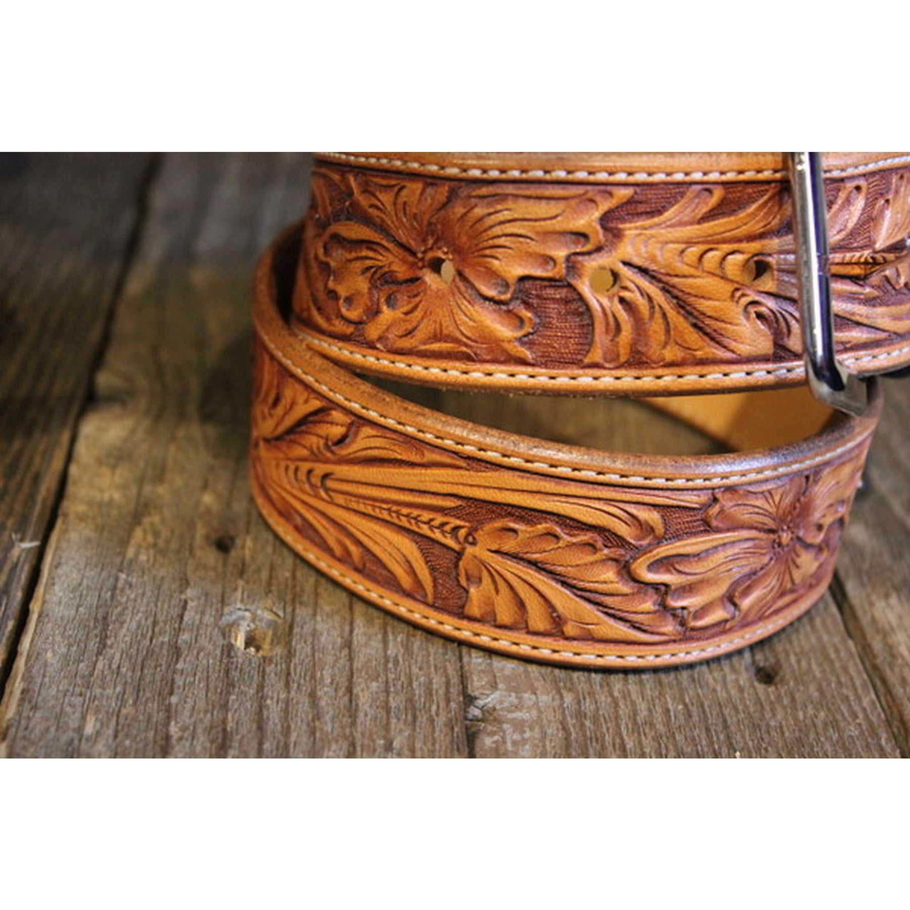 An application scenario or product detail of custom tooled leather belts - Image 5