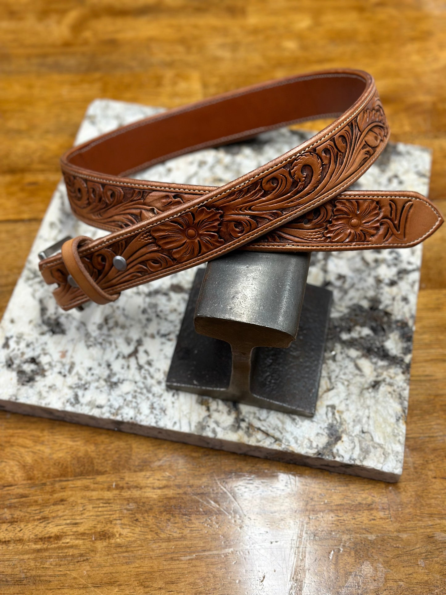 An application scenario or product detail of custom tooled leather belts - Image 13