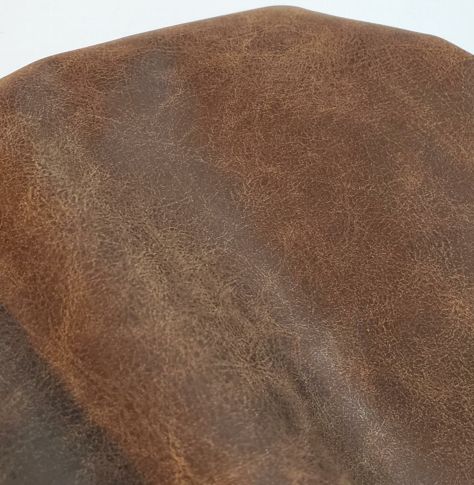 An application scenario or product detail of distressed faux leather - Image 10