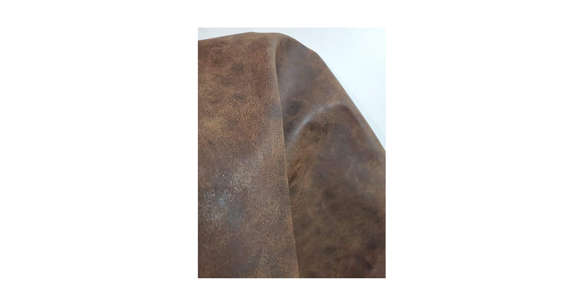 An application scenario or product detail of distressed faux leather - Image 15
