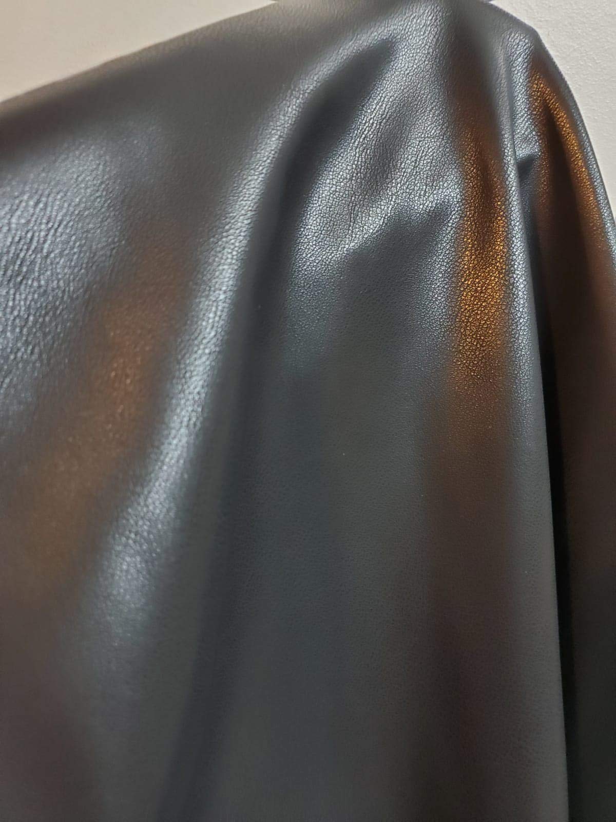 An application scenario or product detail of faux leather garment fabric - Image 16