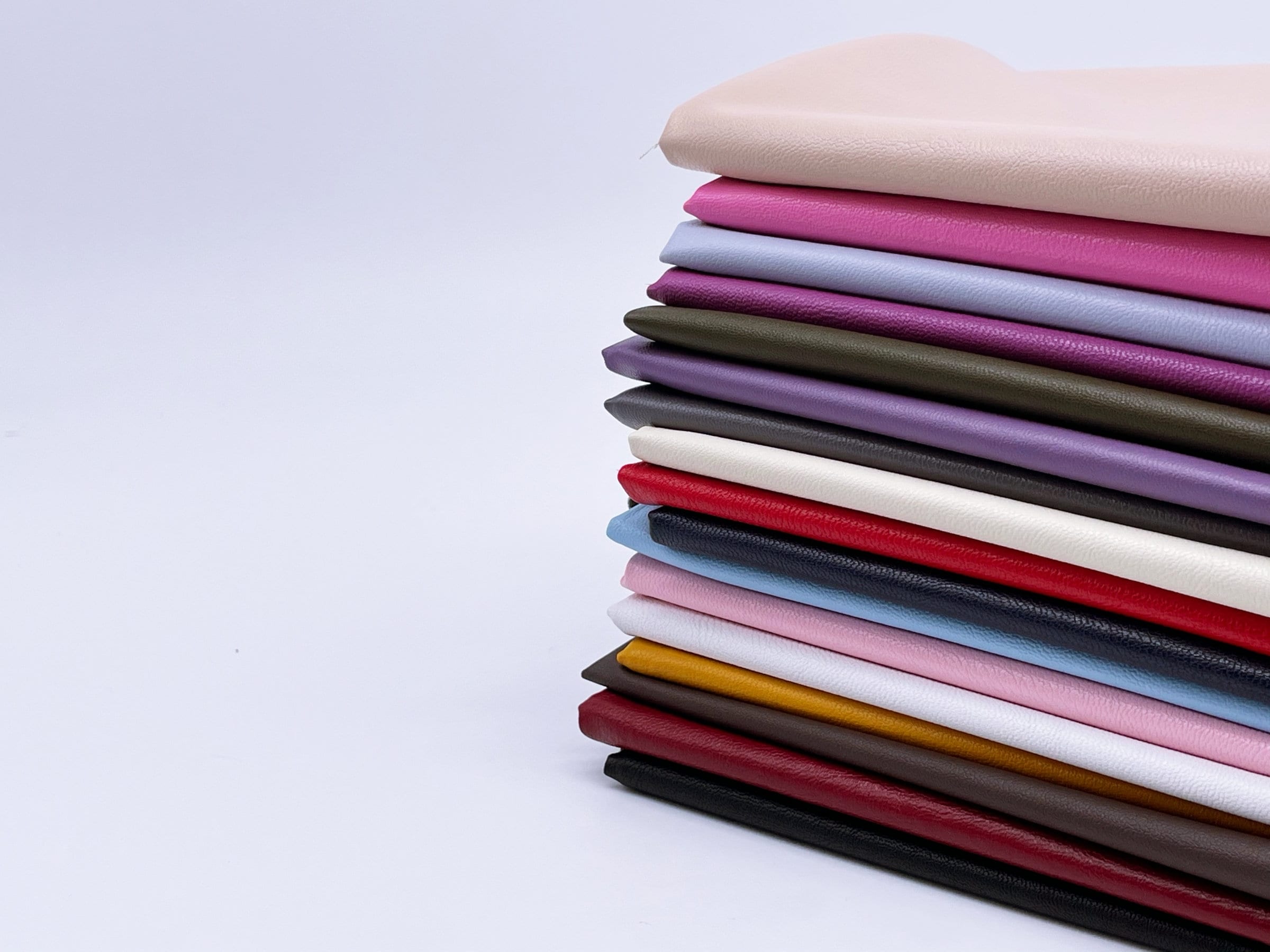 An application scenario or product detail of faux leather material for clothing - Image 13