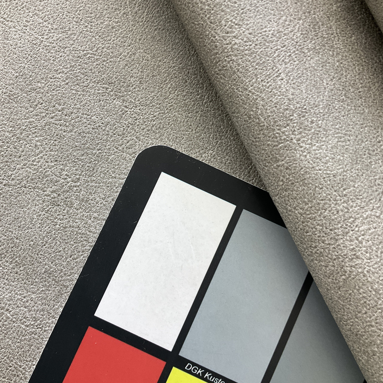 An application scenario or product detail of gray leather fabric - Image 12