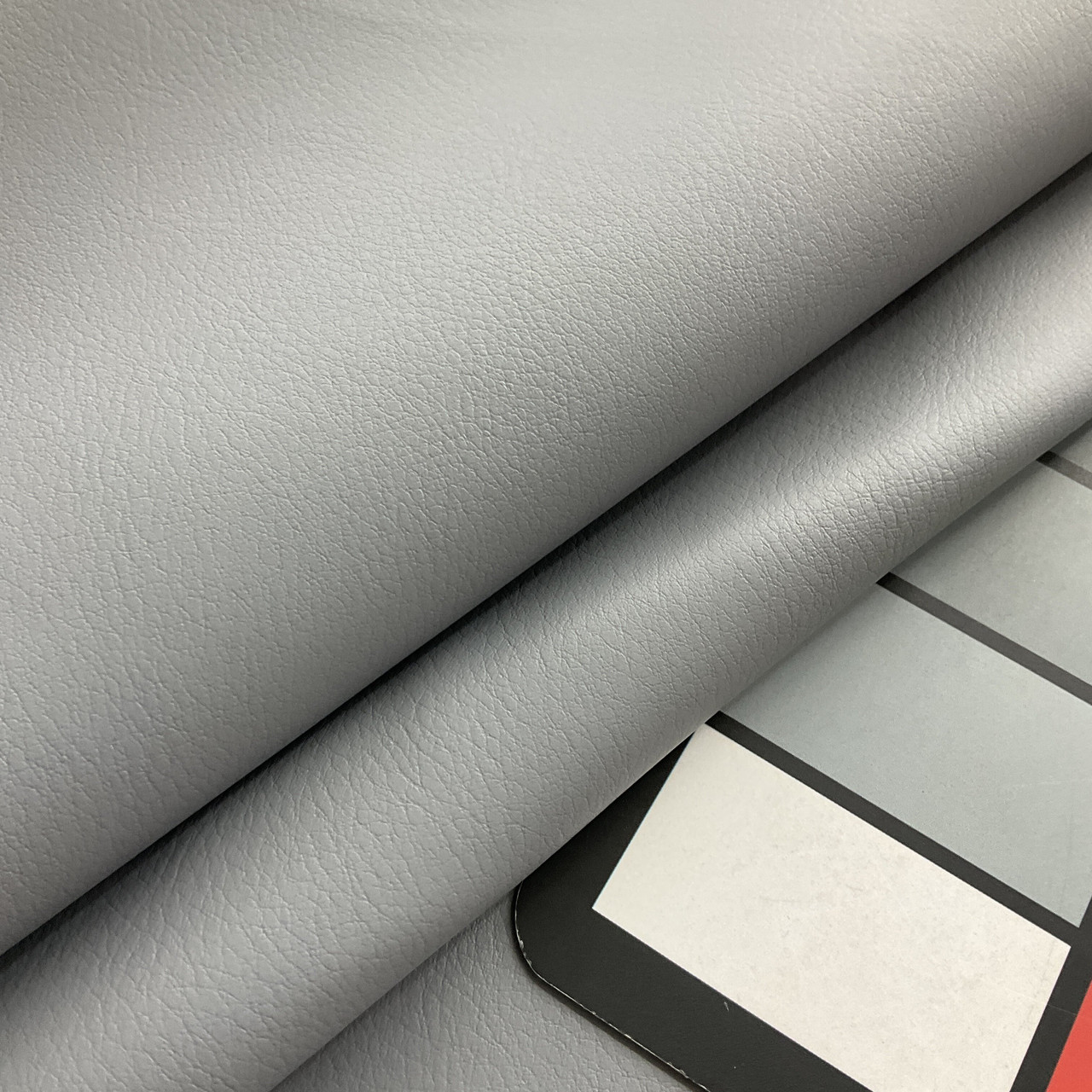 An application scenario or product detail of gray leather fabric - Image 16