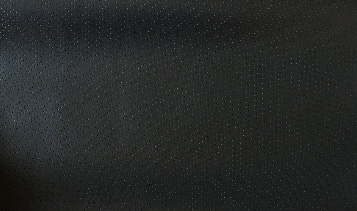 An application scenario or product detail of grey leather fabric - Image 13