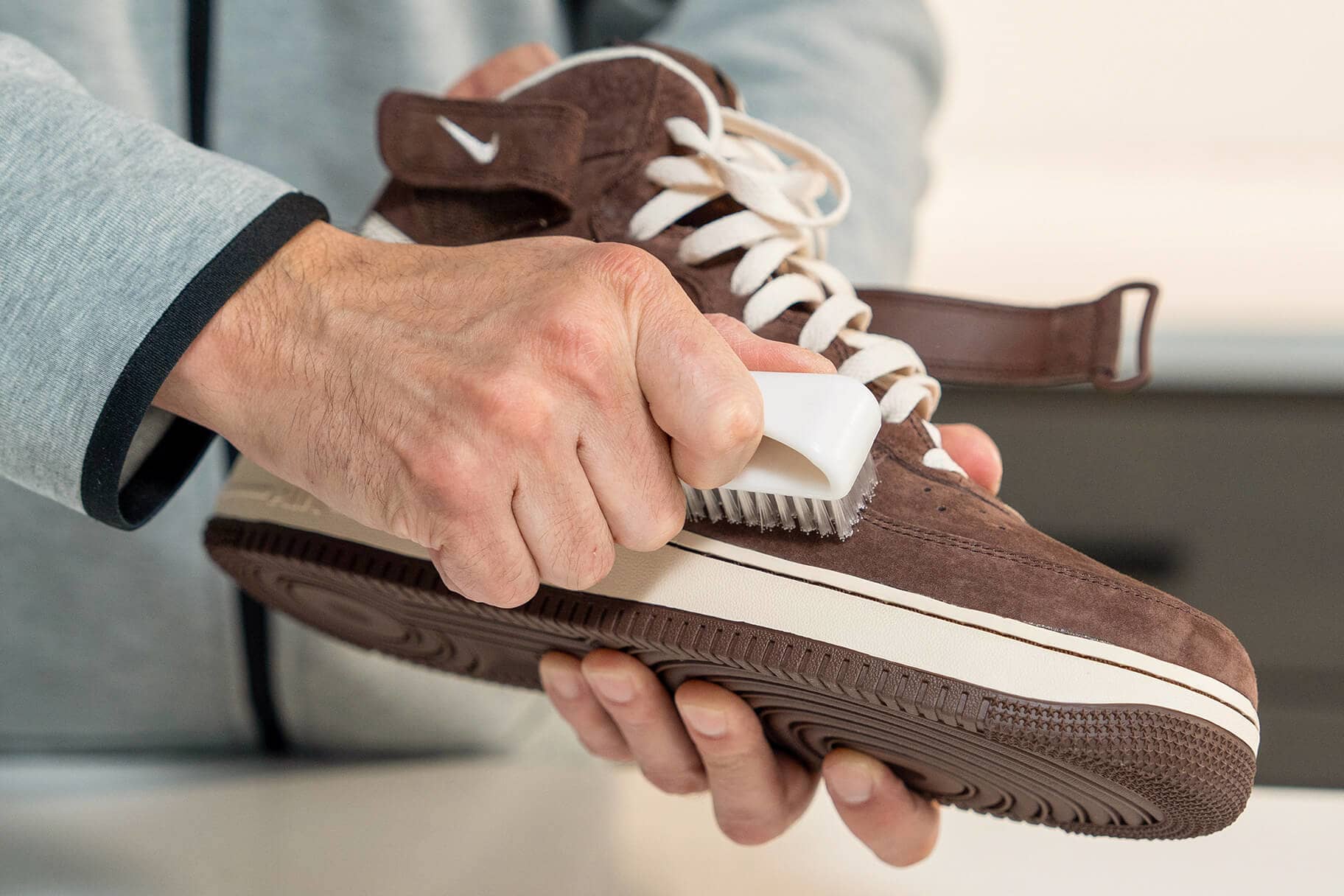 An application scenario or product detail of how to clean synthetic suede shoes - Image 4