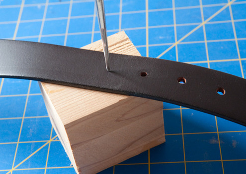 An application scenario or product detail of how to make a hole in a leather belt - Image 7