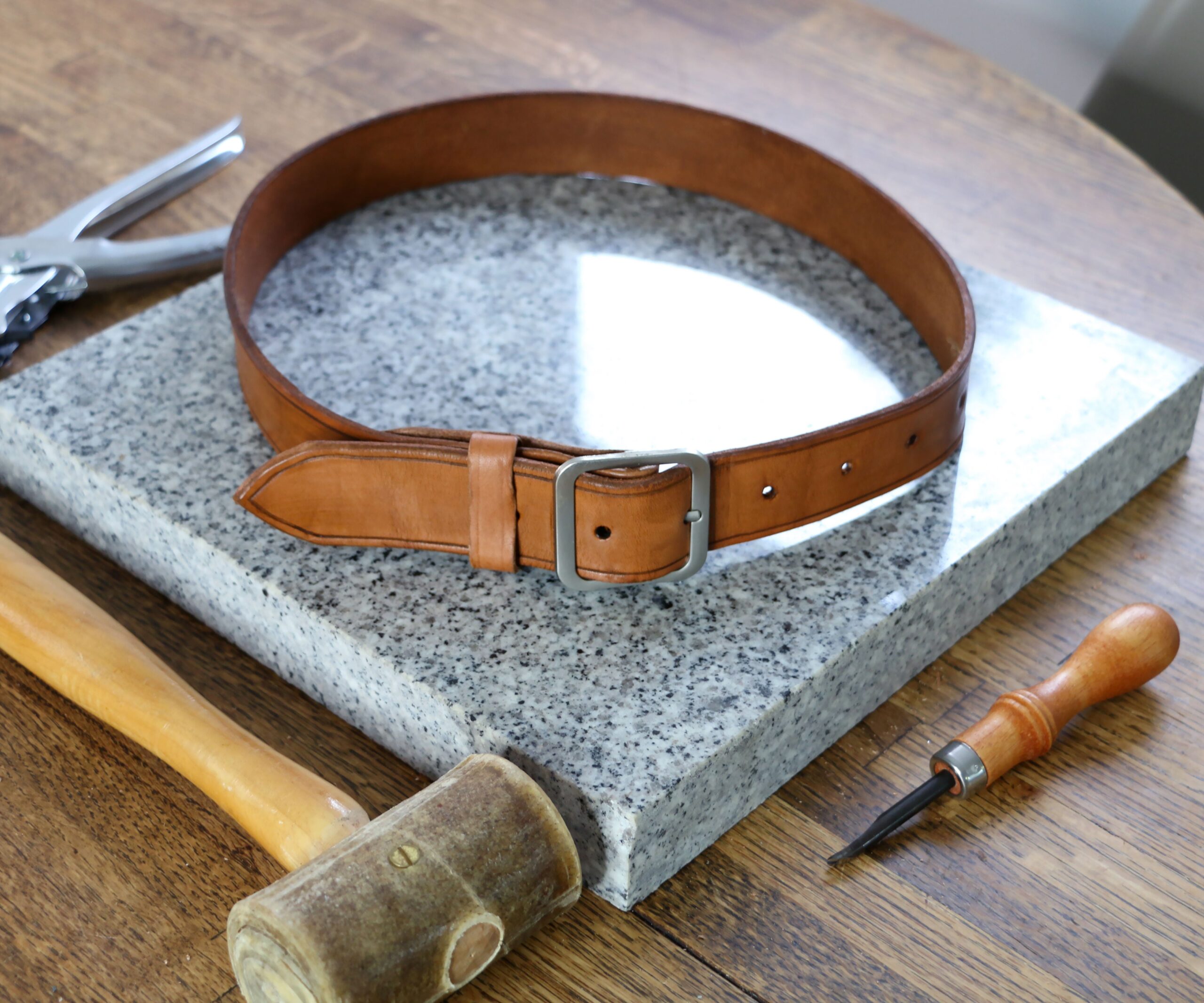 An application scenario or product detail of how to make a leather belt - Image 1