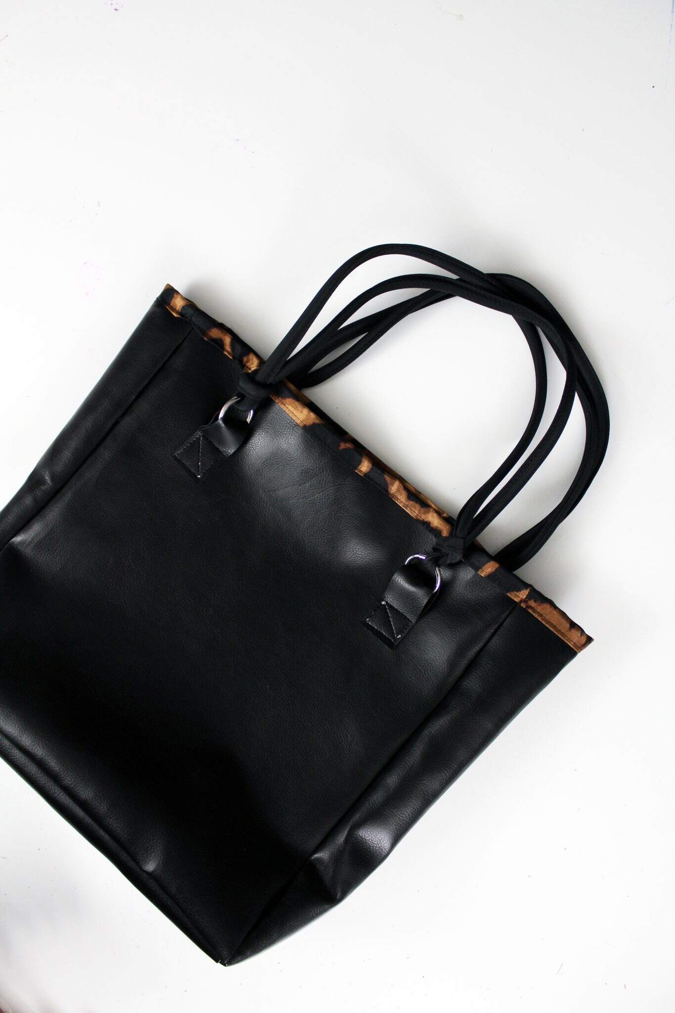 An application scenario or product detail of how to make a leather purse - Image 18