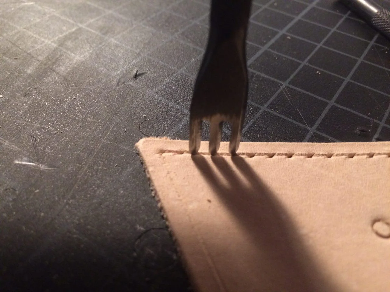 An application scenario or product detail of how to make holes in leather - Image 9