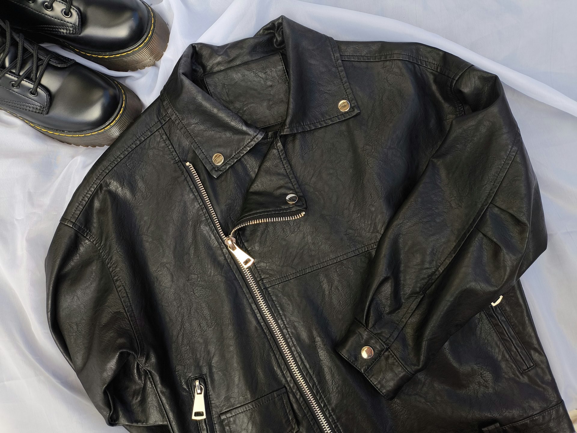 An application scenario or product detail of leather coat cleaning service - Image 21