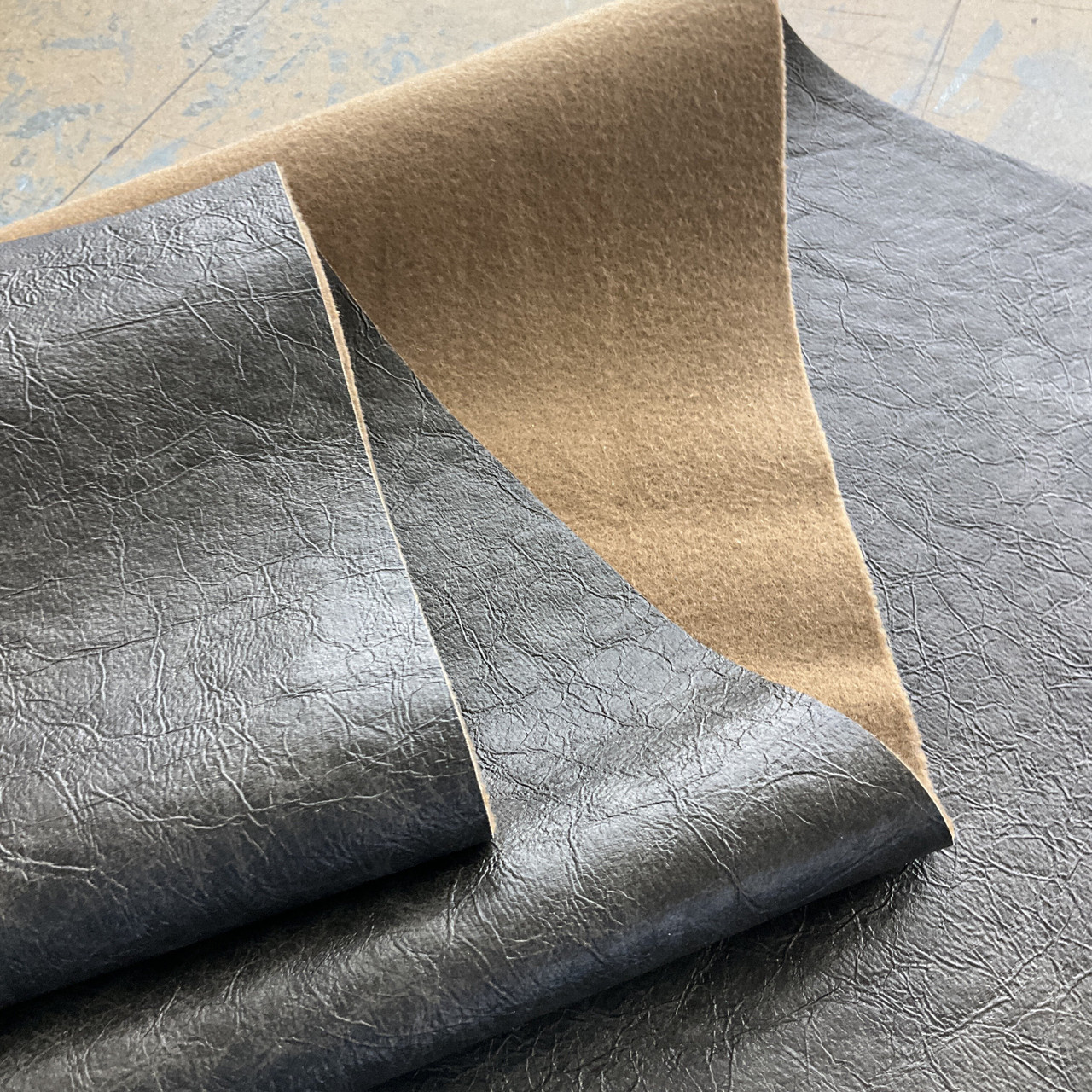 An application scenario or product detail of leather fabric by the yard - Image 19