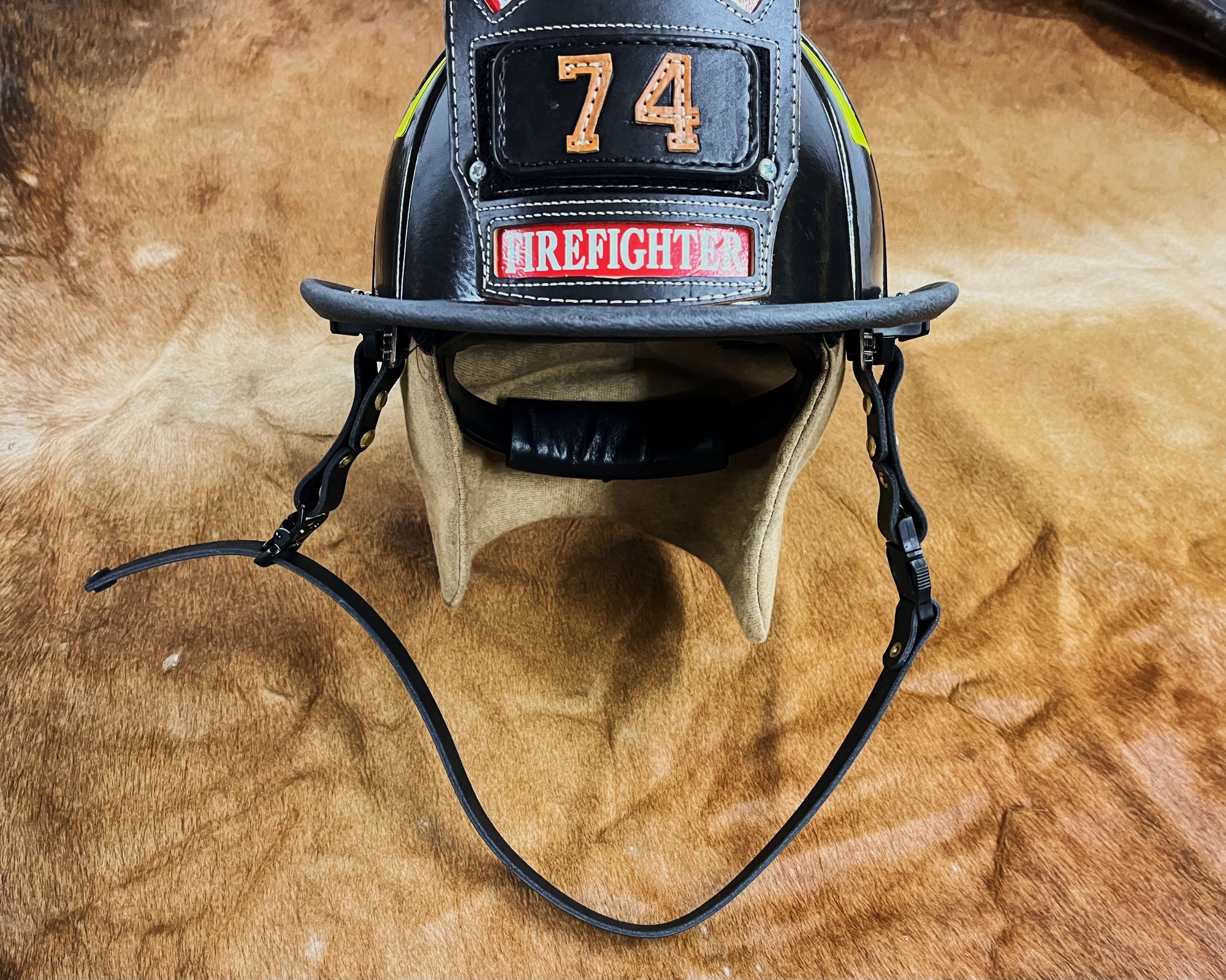 An application scenario or product detail of leather fire helmet chin strap - Image 3