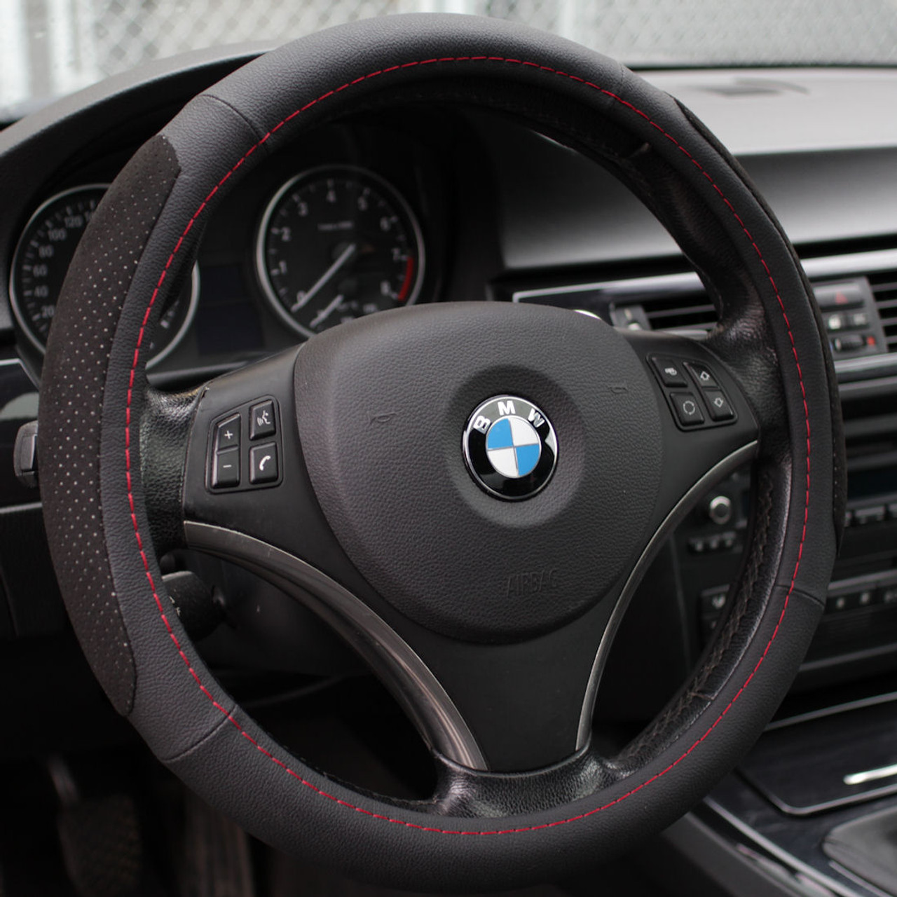 An application scenario or product detail of leather steering wheel cover custom - Image 1