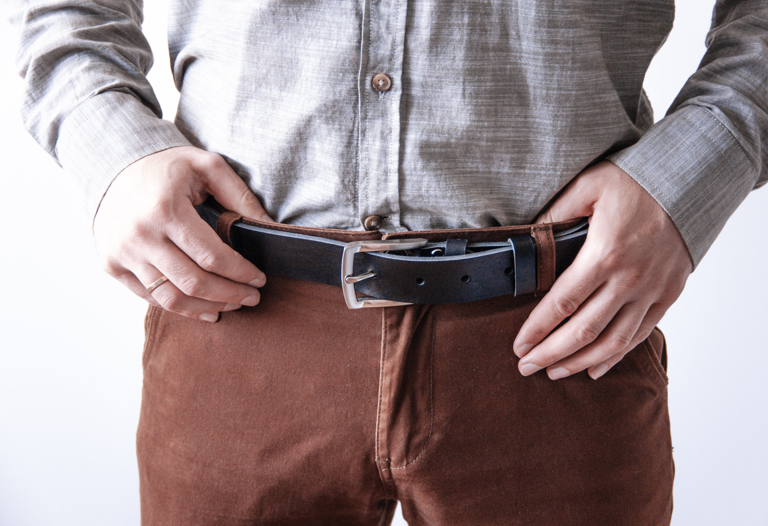 An application scenario or product detail of mens custom leather belts - Image 1